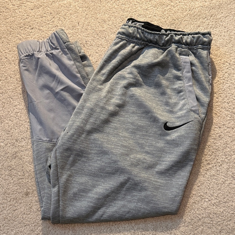 Nike Gray Striped Joggers with Black Swoosh